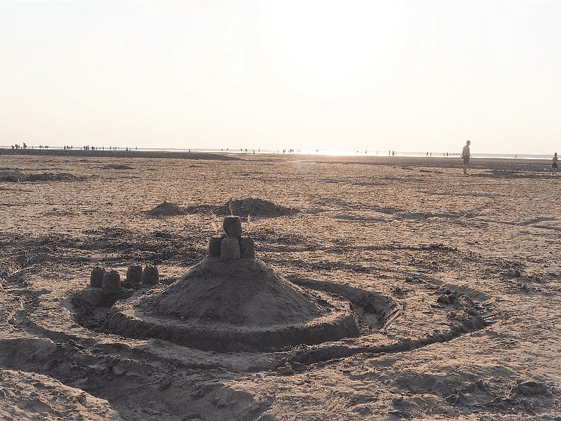 Sandburg am Strand